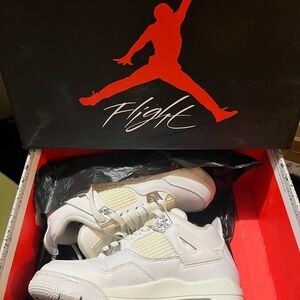 Air Jordan 4 Retro White Sneakers